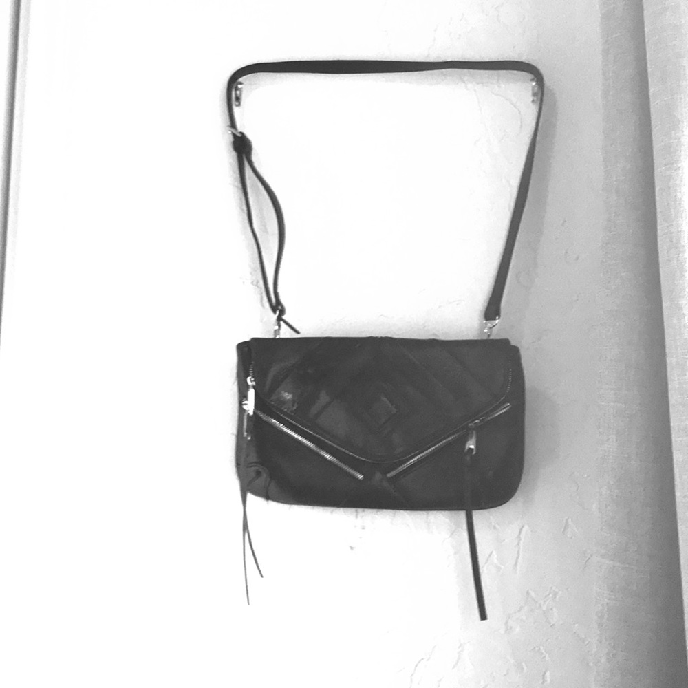 Jose’s black purse. Brand New without tags!
